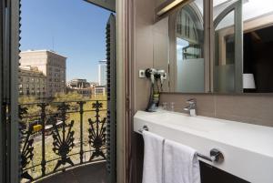 Kylpyhuone majoituspaikassa Hotel Actual