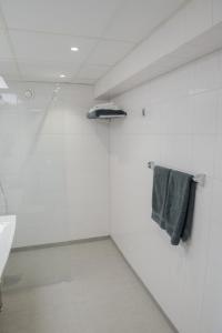 Koupelna v ubytování Hotel Stensson + 37 fotografií