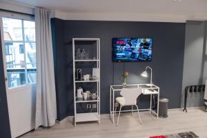 TV a/nebo společenská místnost v ubytování Hotel Stensson