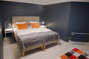 Postel nebo postele na pokoji v ubytování Hotel Stensson