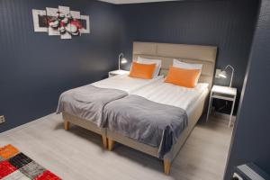 Postel nebo postele na pokoji v ubytování Hotel Stensson
