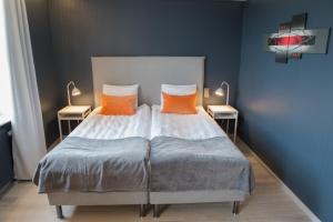 Postel nebo postele na pokoji v ubytování Hotel Stensson