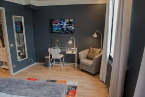 TV a/nebo společenská místnost v ubytování Hotel Stensson