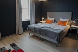 Postel nebo postele na pokoji v ubytování Hotel Stensson