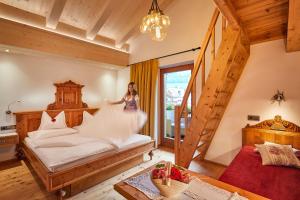 Voodi või voodid majutusasutuse Hotel Al Sonnenhof toas