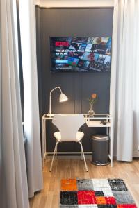 TV a/nebo společenská místnost v ubytování Hotel Stensson