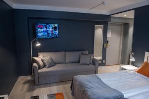 Postel nebo postele na pokoji v ubytování Hotel Stensson