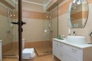 A bathroom at Hotel Villa Magus