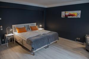 Postel nebo postele na pokoji v ubytování Hotel Stensson