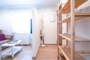 a small room with a loft bed and a living room at For You Rentals South of Madrid Portazgo apartment SDM21 in Madrid