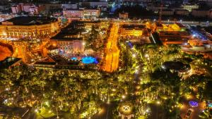 an aerial view of a city at night at Al Masa Hotel Nasr City in Cairo