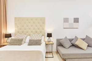 Postel nebo postele na pokoji v ubytování LEEWAYS LOFT XVI in GRAN VÍA