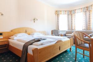 Letto o letti in una camera di Hotel Sonnenspitze