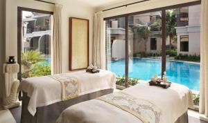 Postel nebo postele na pokoji v ubytování Anantara The Palm Dubai Resort