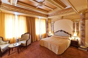 Кровать или кровати в номере Villa Arte Hotel