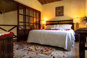 Postel nebo postele na pokoji v ubytování MAJU HOTEL CAMPESTRE & SPA