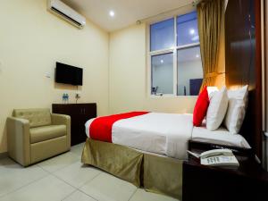 TV a/nebo společenská místnost v ubytování SH Hotel