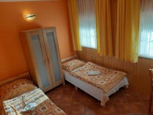 Tempat tidur dalam kamar di Rybí Dům