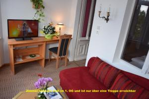 TV a/nebo společenská místnost v ubytování Hotel Nordlicht