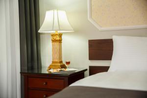 Letto o letti in una camera di Tea for Two Hotel