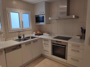 Kjøkken eller kjøkkenkrok på SUITEDREAMS - Pollancre 61