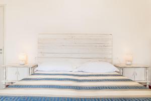 Postel nebo postele na pokoji v ubytování Lia Apartment