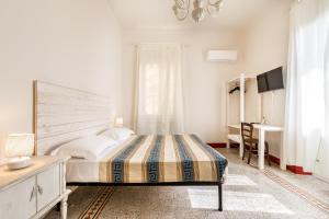 Postel nebo postele na pokoji v ubytování Lia Apartment