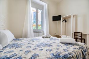 Postel nebo postele na pokoji v ubytování Lia Apartment