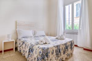 Postel nebo postele na pokoji v ubytování Lia Apartment