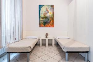 Postel nebo postele na pokoji v ubytování Lia Apartment