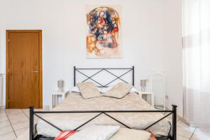 Postel nebo postele na pokoji v ubytování Lia Apartment