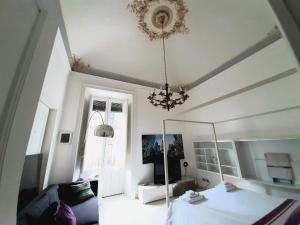 Postel nebo postele na pokoji v ubytování Casa del corso