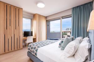 Posteľ alebo postele v izbe v ubytovaní Sissy Luxury Villa Chania