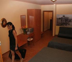 Postel nebo postele na pokoji v ubytování Albergo Corte Antica