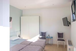 Voodi või voodid majutusasutuse Nana / Sobe & Apartmani toas