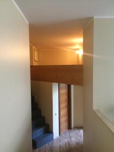 a view of a staircase in a house at Cat Garden Premium Apartments Riga in Rīga