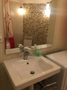 Ванная комната в Cat Garden Premium Apartments Riga