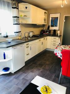 Kuchyň nebo kuchyňský kout v ubytování VIP Appartement