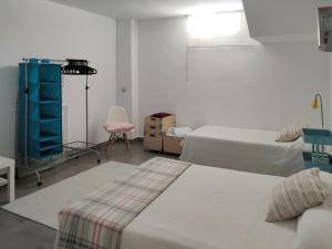 Postel nebo postele na pokoji v ubytování Playa Wifi AA Limpieza + 32 fotografií