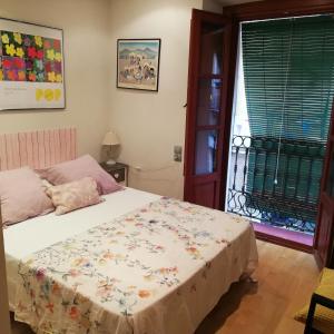 Cama o camas de una habitación en Apartamento Merceria - Tarragona