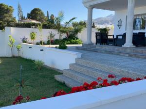 Zahrada ubytování Maison Alriad - Alojamiento familiar tranquilo cerca del mar con jardín, porche y parking privado en el interior de la finca no apto para fiestas