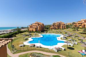 an aerial view of a pool at a resort at los granados 1221 in Manilva