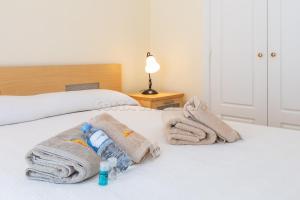 Posteľ alebo postele v izbe v ubytovaní marina duquesa 519