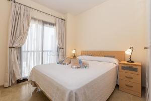Posteľ alebo postele v izbe v ubytovaní marina duquesa 519 + 25 fotografií