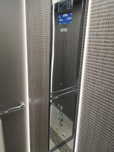 a shower in a bathroom with a glass door at Riviera Olympus Gods in Paralia Katerinis