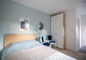 Voodi või voodid majutusasutuse Nana / Sobe & Apartmani toas