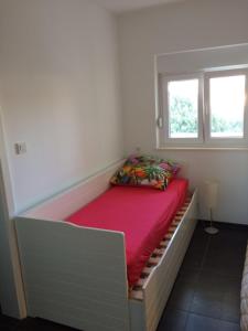 Postel nebo postele na pokoji v ubytování Apartments Madzari - Ciovo - Pool