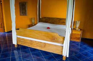 Postel nebo postele na pokoji v ubytování Hotel Vista de Olas