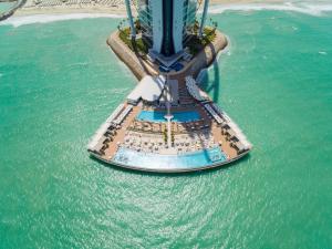 an aerial view of a cruise ship in the water at Jumeirah Burj Al Arab Dubai in Dubai
