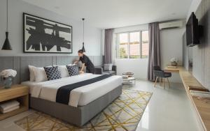TV a/nebo společenská místnost v ubytování Altos Hotel